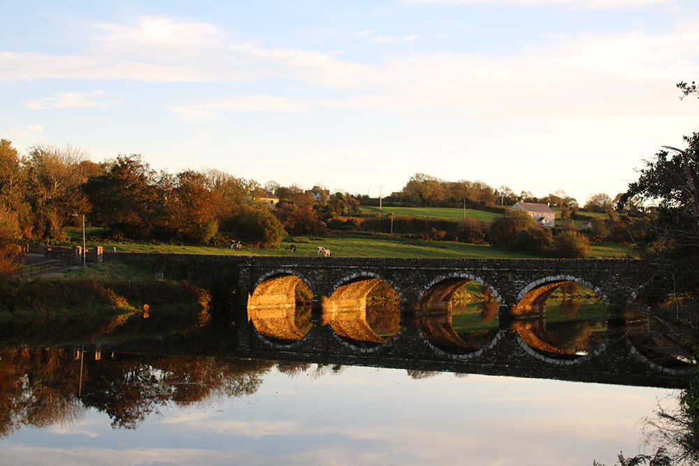 Mirror-like reflection of the Ilen River in Skibbereen.