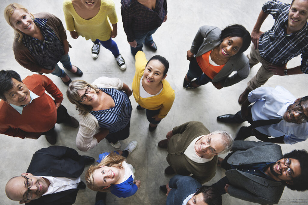 A vibrant community gathering at a local Timebanking event.