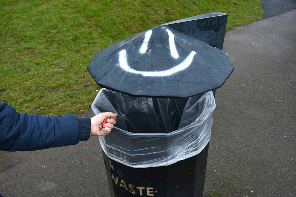 Litter bin placed amidst the greenery of a Tidy Towns 2022 park.